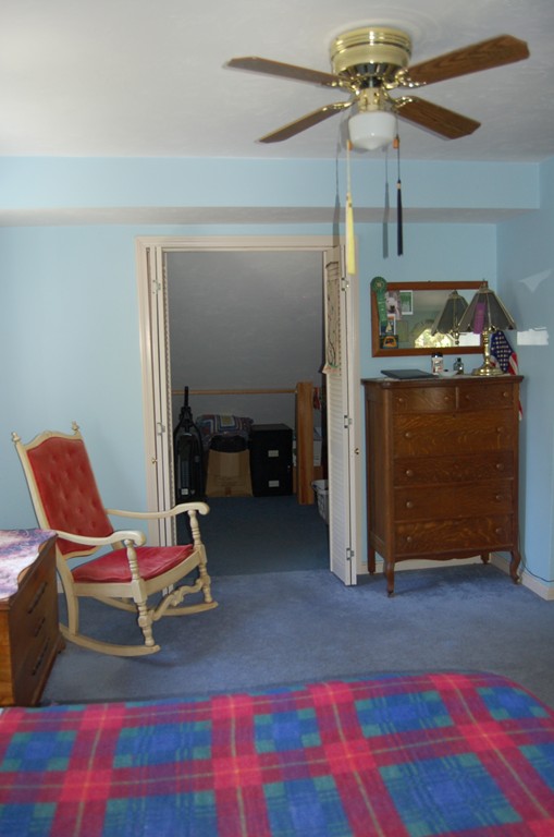 519 County Road Rochester, MA 02576 - Photo 13 of 22 a living room with furniture and a fireplace