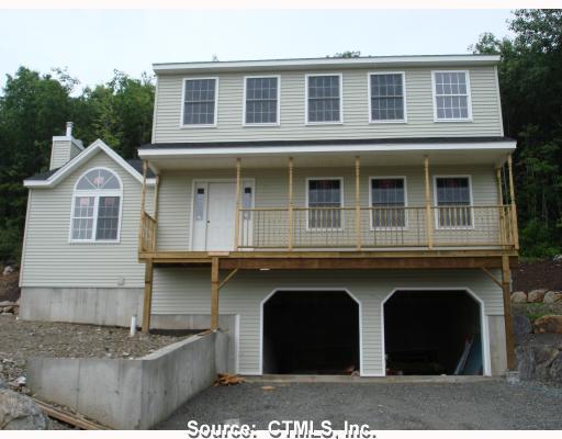 97 Tyler Hill Road Naugatuck, CT 06770 - Photo 1 of 1 a front view of a house with balcony