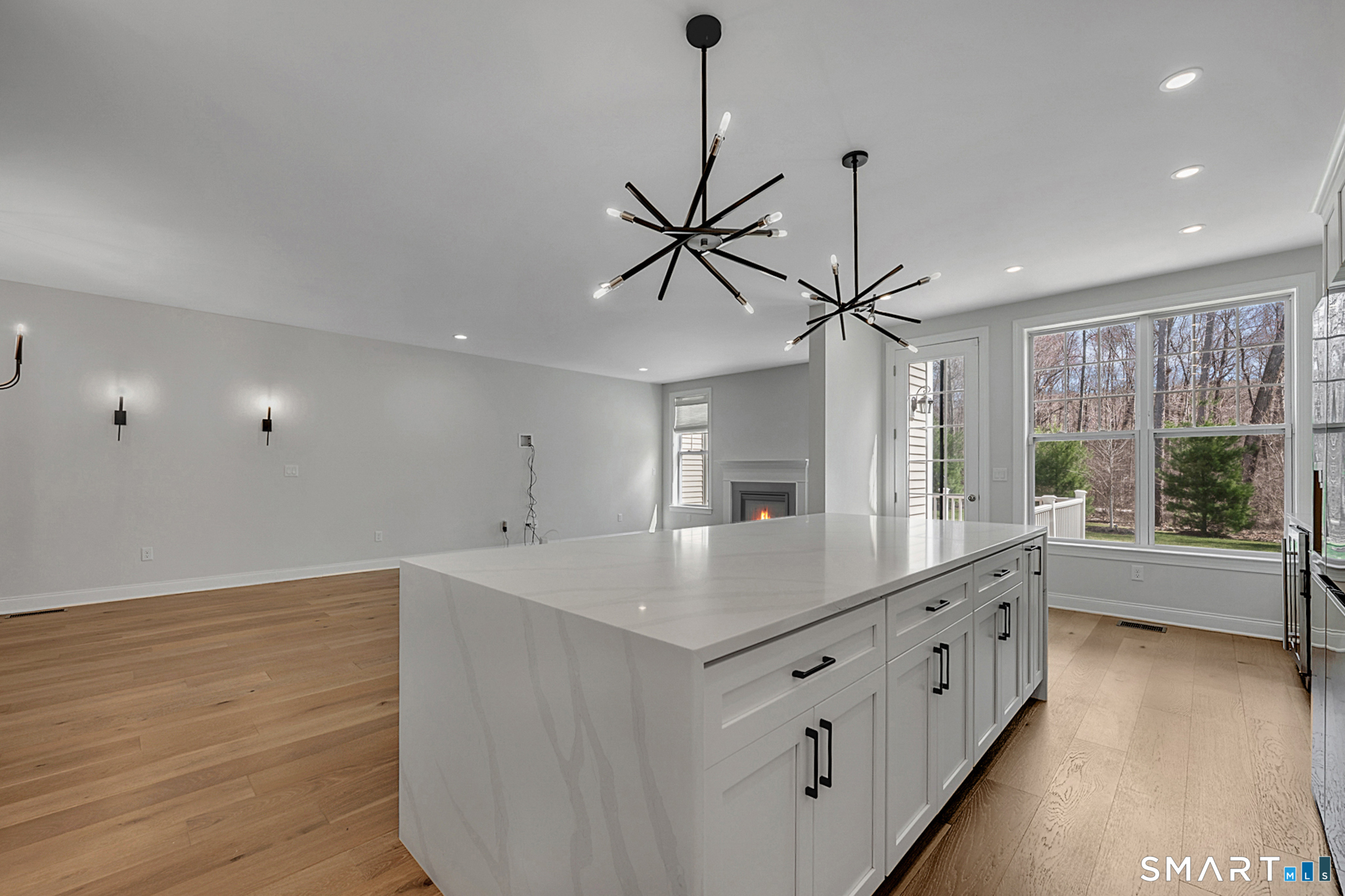 193 Ridgewood Drive, Unit 193 Middlebury, CT 06762 - Photo 11 of 40 a kitchen with sink cabinets and window
