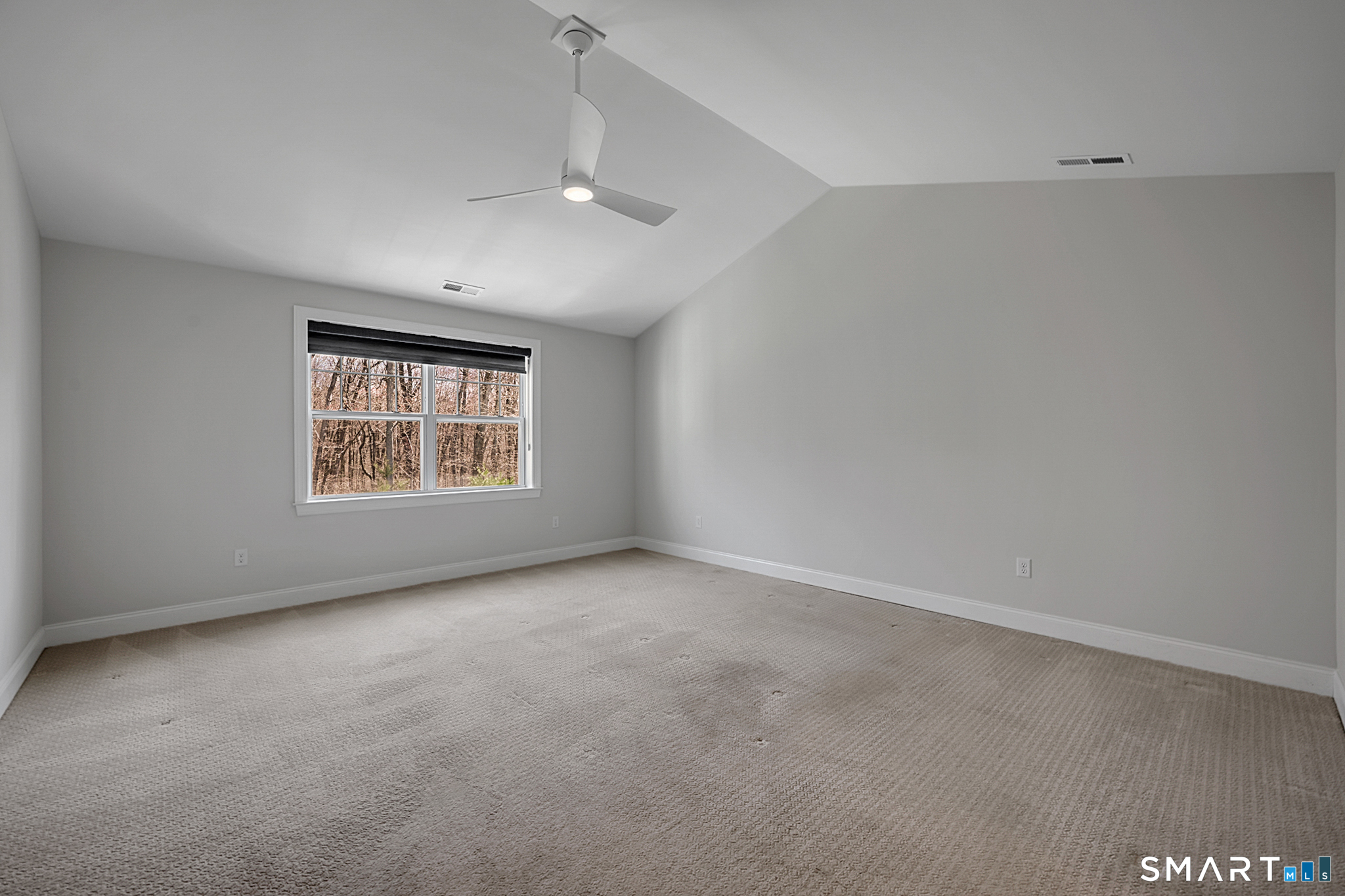 193 Ridgewood Drive, Unit 193 Middlebury, CT 06762 - Photo 23 of 40 an empty room with a window