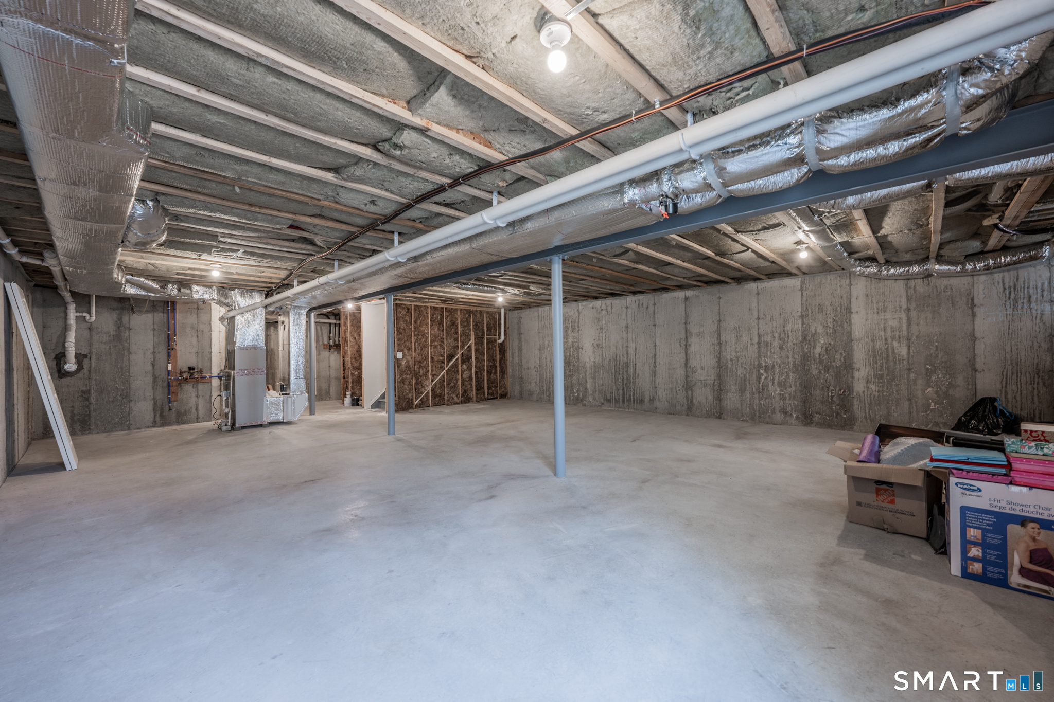 193 Ridgewood Drive, Unit 193 Middlebury, CT 06762 - Photo 30 of 40 a view of empty room with wooden ceiling
