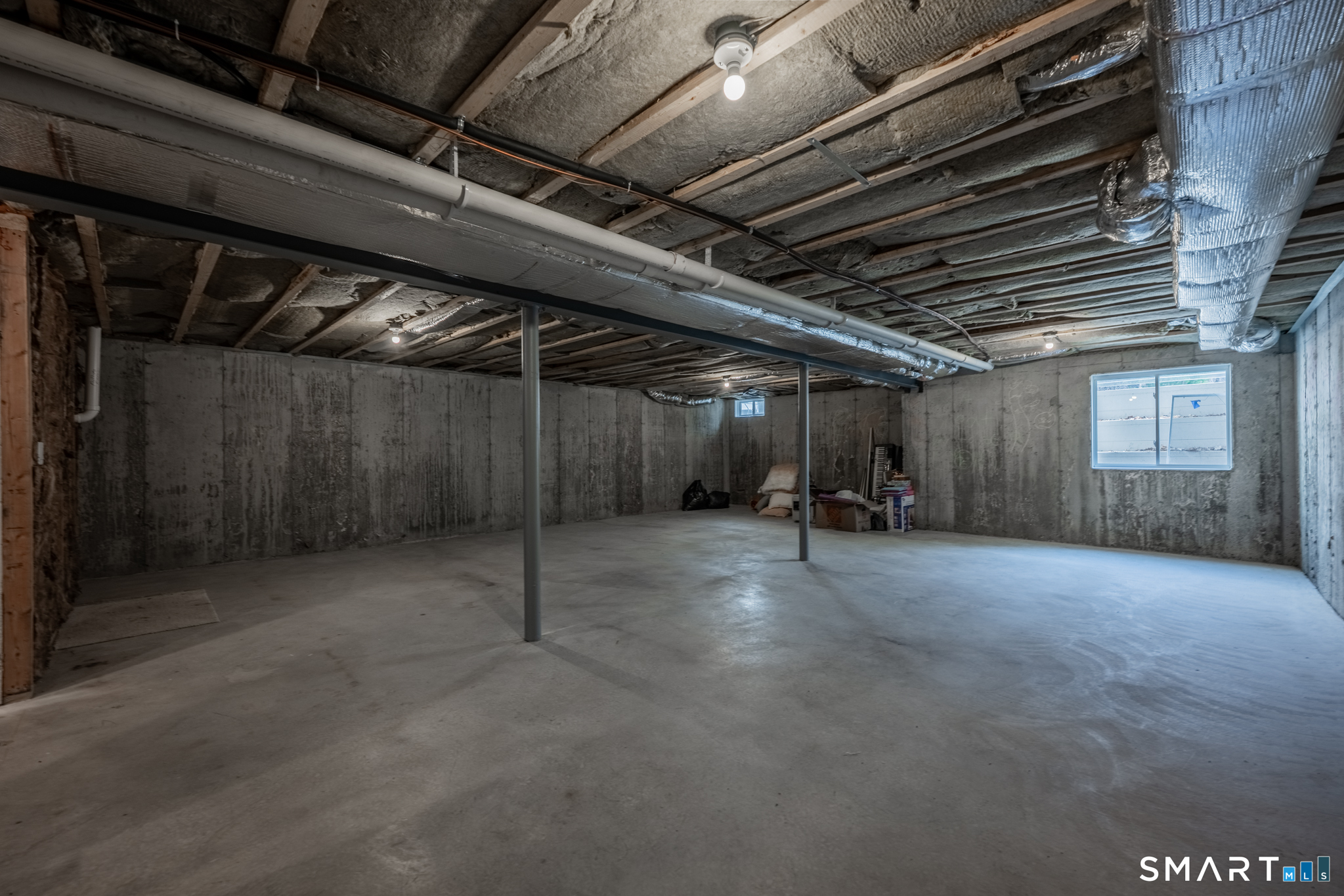193 Ridgewood Drive, Unit 193 Middlebury, CT 06762 - Photo 31 of 40 a view of empty room with wooden ceiling