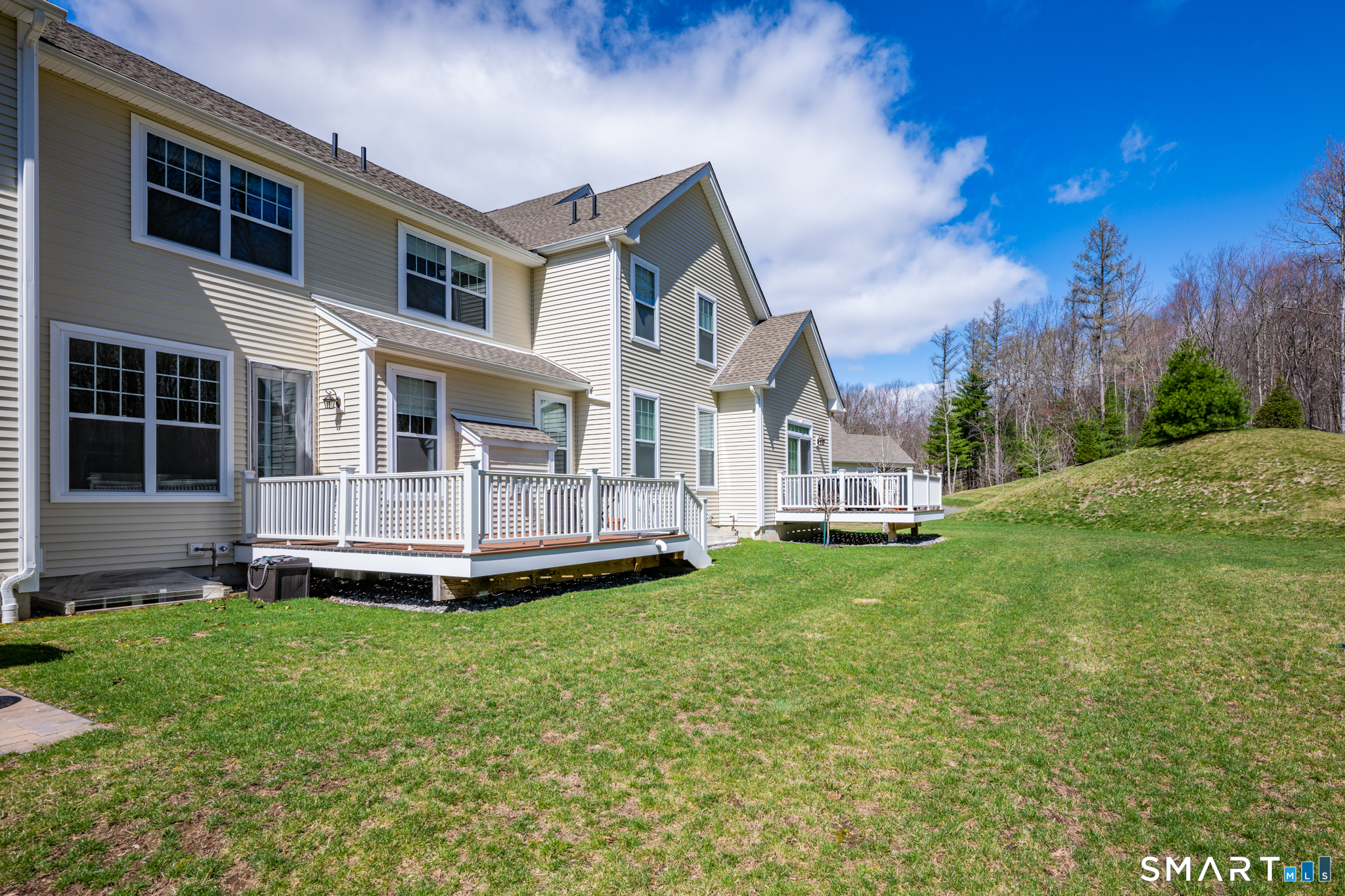 193 Ridgewood Drive, Unit 193 Middlebury, CT 06762 - Photo 36 of 40 a view of a house with a yard