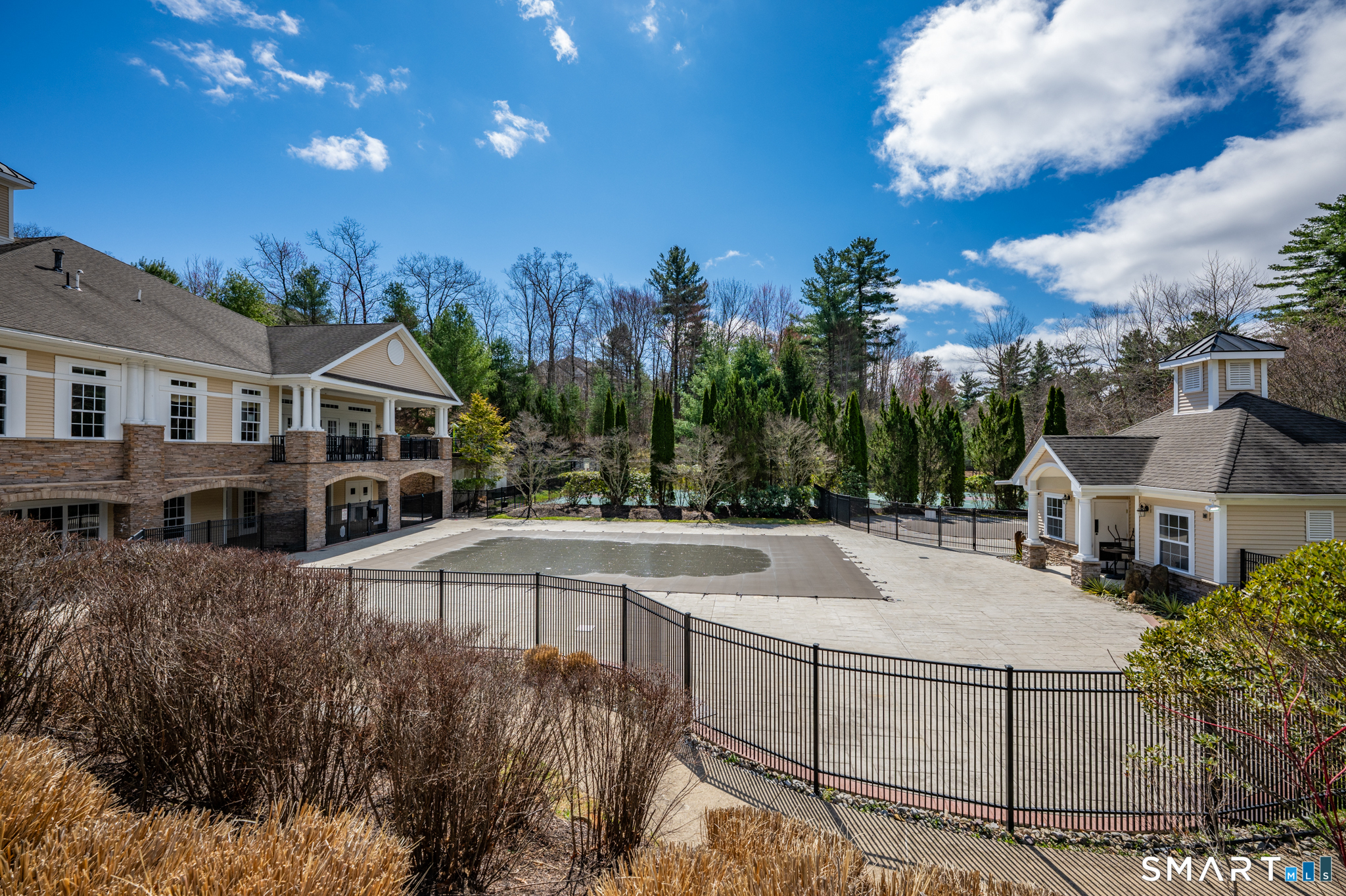 193 Ridgewood Drive, Unit 193 Middlebury, CT 06762 - Photo 40 of 40 a view of a house with cars park