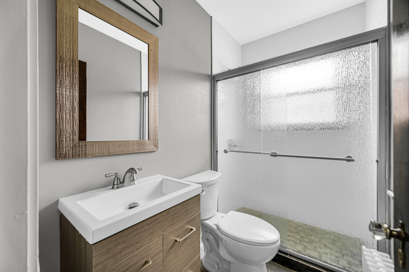 248 Ruth Street Calumet City, IL 60409 - Photo 13 of 19 a bathroom with a sink toilet and a mirror