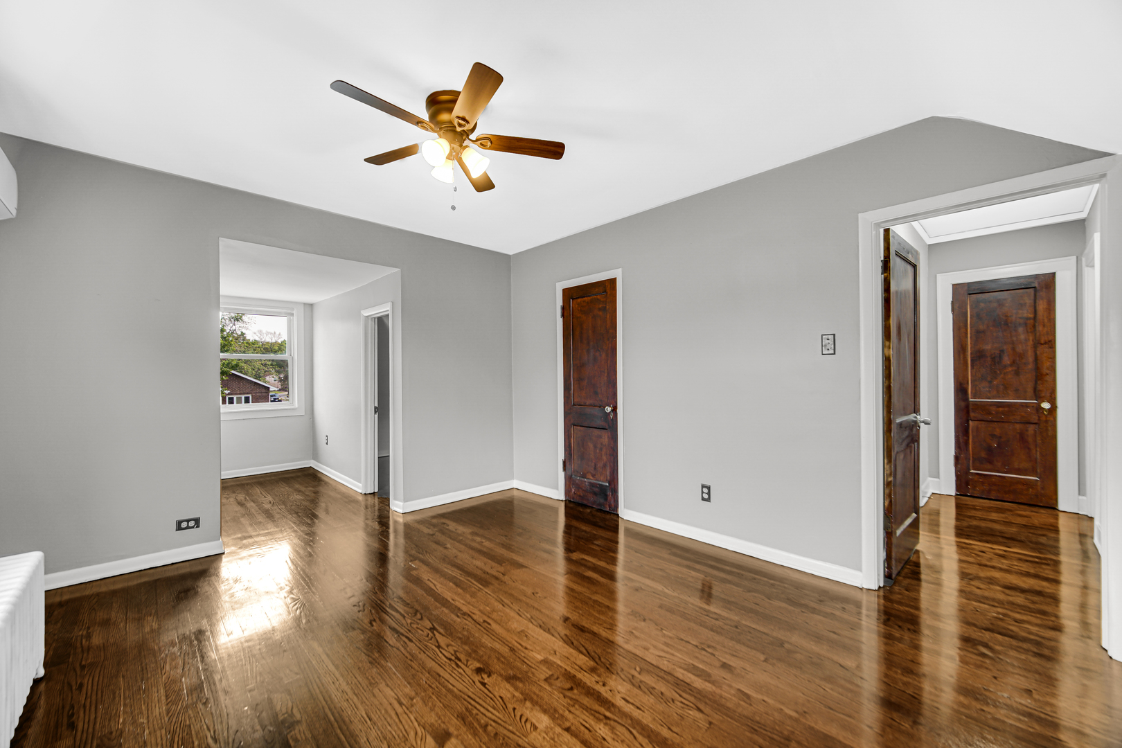 248 Ruth Street Calumet City, IL 60409 - Photo 16 of 19 a view of an empty room with wooden floor
