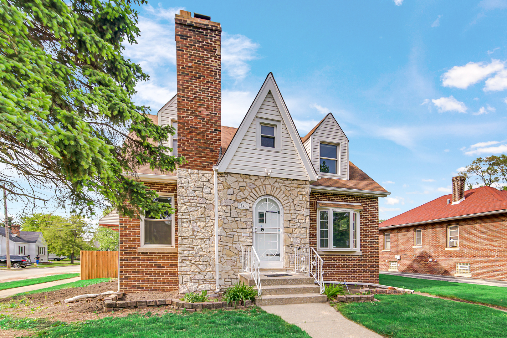 248 Ruth Street Calumet City, IL 60409 - Photo 2 of 19 a view of front of a house with a yard
