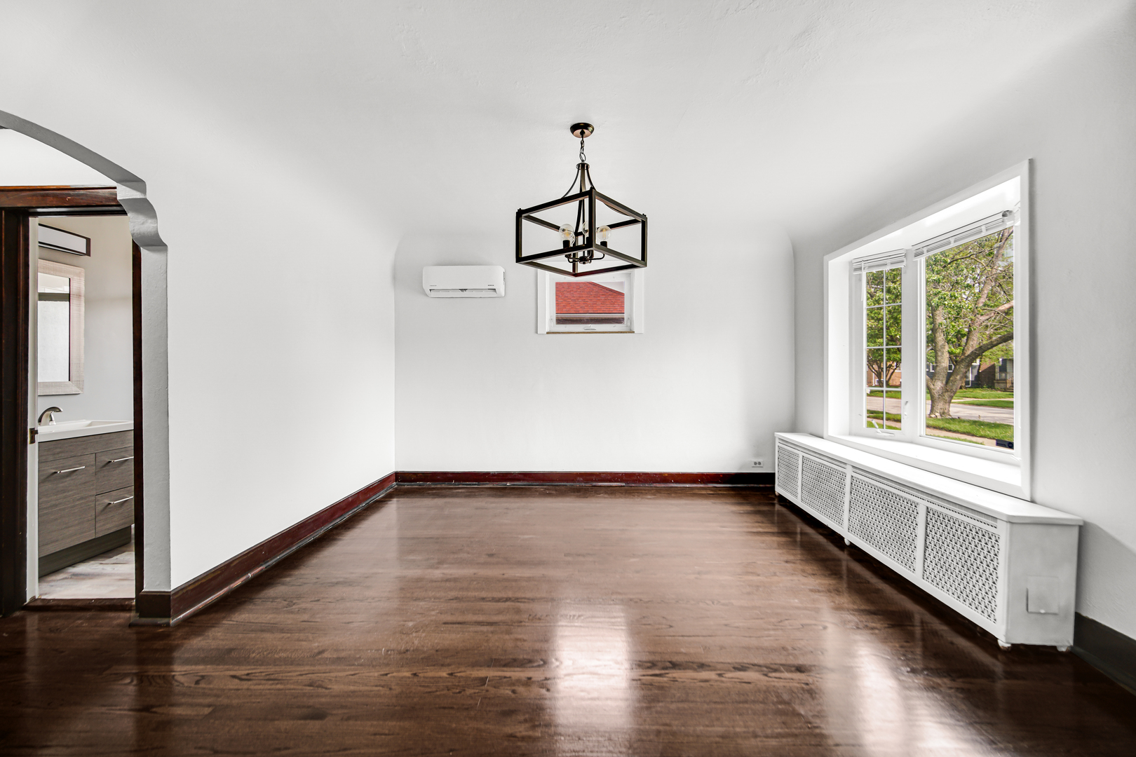 248 Ruth Street Calumet City, IL 60409 - Photo 6 of 19 a room with hard wood floors and a window