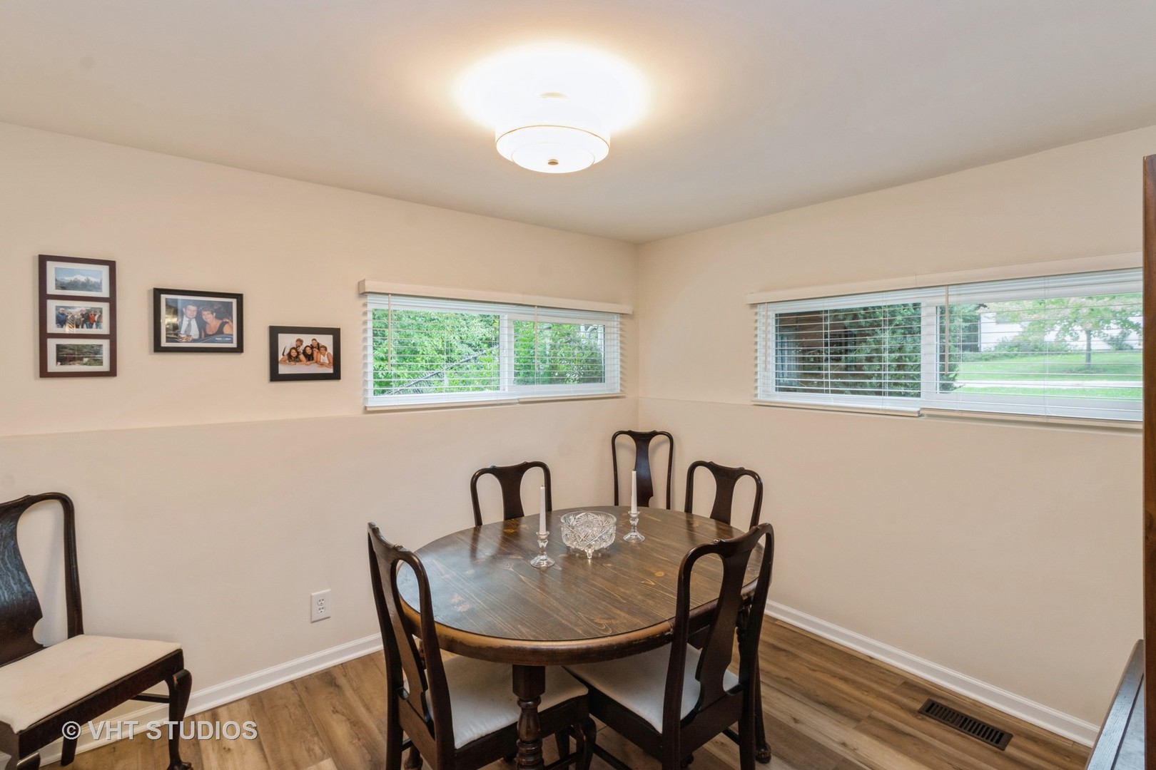 102 Big Oaks Road Streamwood, IL 60107 - Photo 9 of 11 a view of a dining room with furniture and window