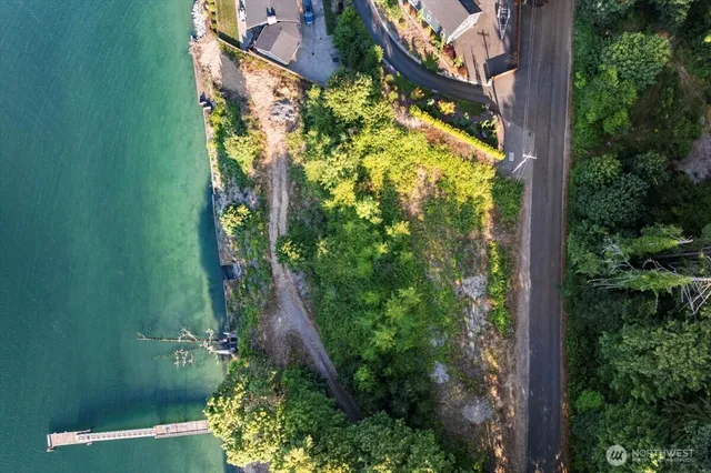 an aerial view of residential house with an outdoor space
