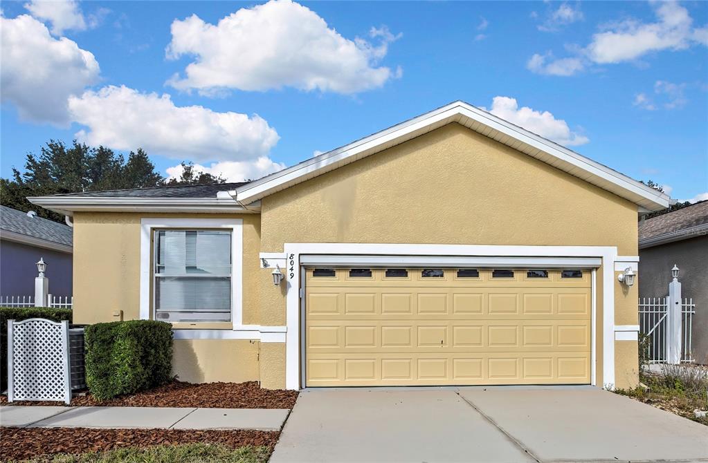 8049 Sanguinelli Road Land O Lakes, FL 34637 - Photo 2 of 45 a view of house with backyard