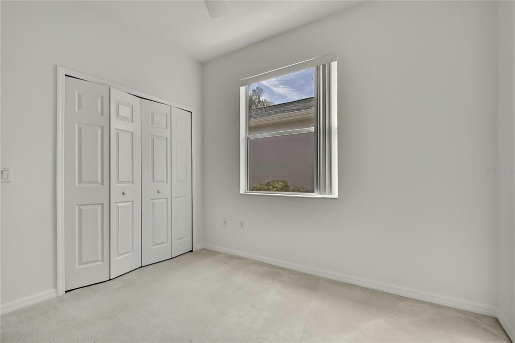 8049 Sanguinelli Road Land O Lakes, FL 34637 - Photo 28 of 45 a view of an empty room