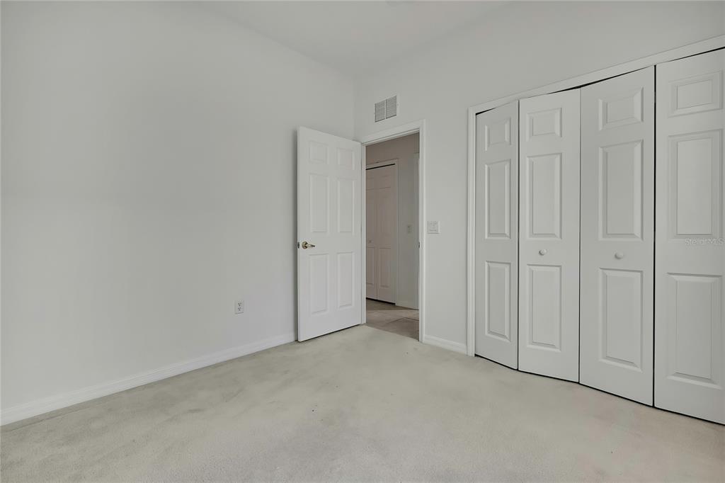 8049 Sanguinelli Road Land O Lakes, FL 34637 - Photo 29 of 45 a view of an empty room