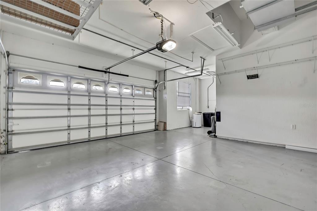 8049 Sanguinelli Road Land O Lakes, FL 34637 - Photo 35 of 45 a view of a garage