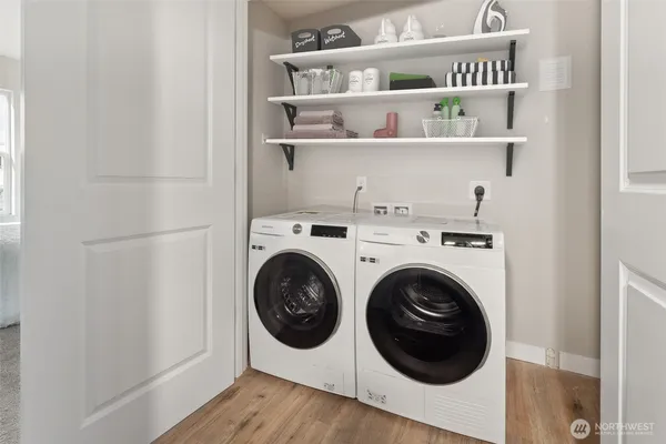 a utility room with dryer and washer