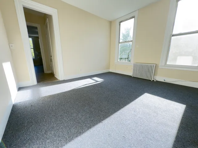 an empty room with windows