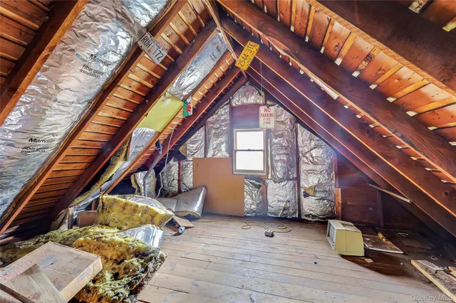 a backyard of a house with seating space