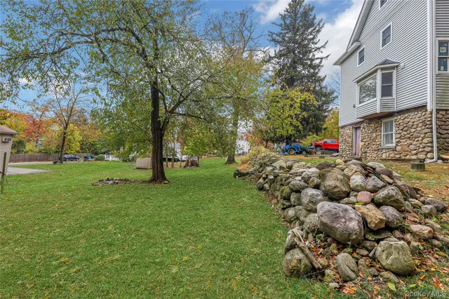 a view of a park with large trees