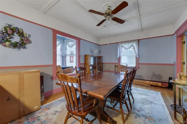 a view of a dining room with furniture