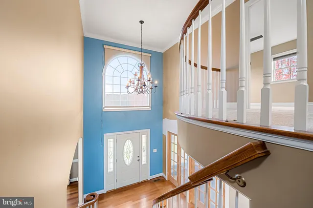 a bathroom with a sink mirror toilet and bathtub