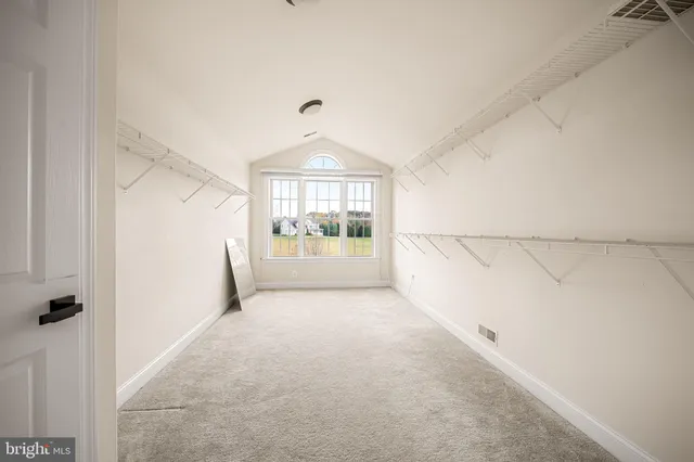 a view of a house with wooden floor and outdoor space