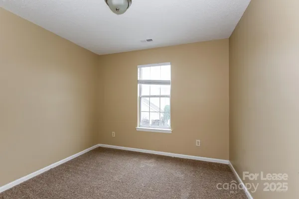 an empty room with window