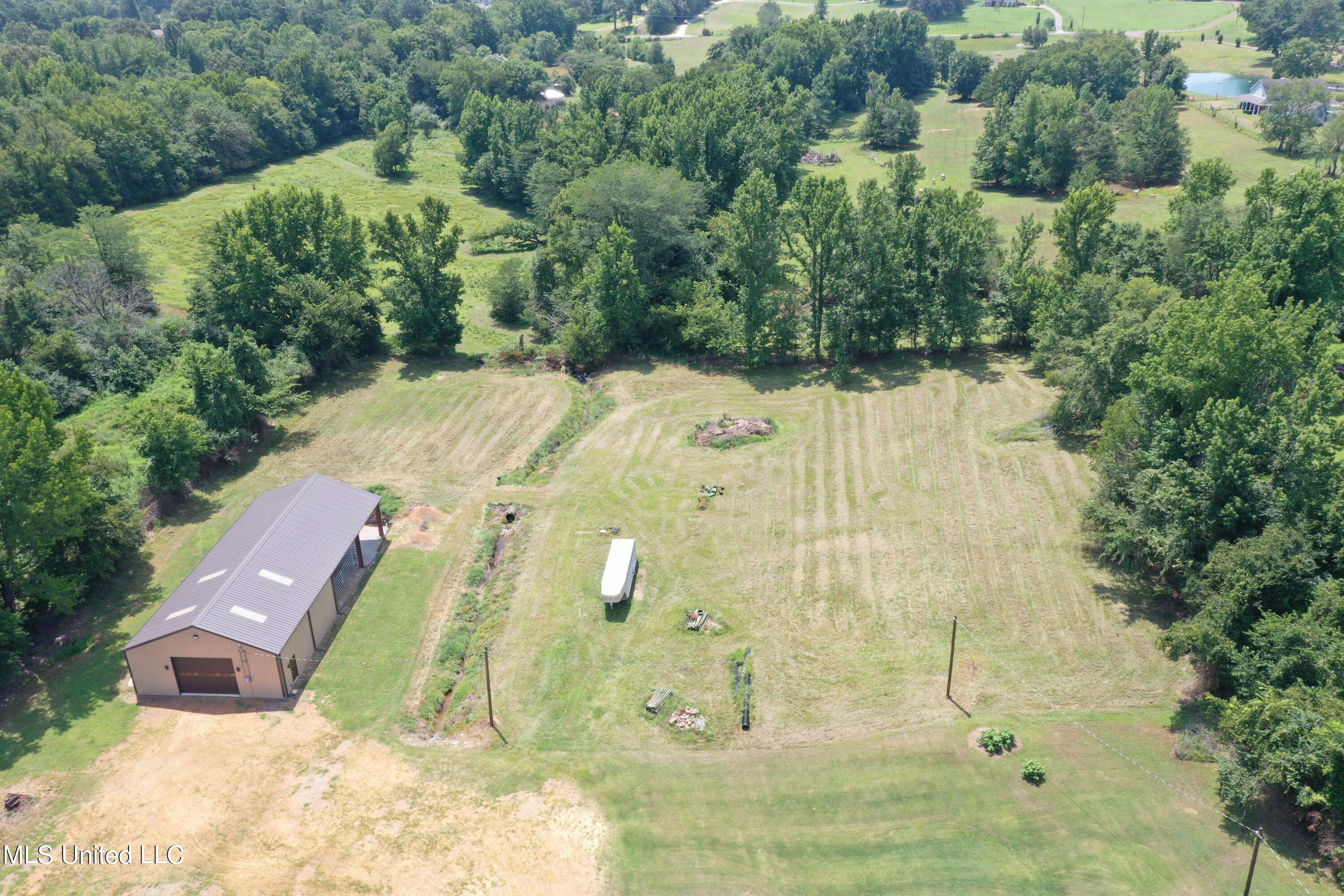 1374 Gaines Road Hernando, MS 38632 - Photo 42 of 43 Aerial - Barn and Back of Property
