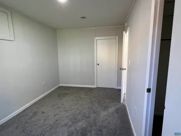 an empty room with closet