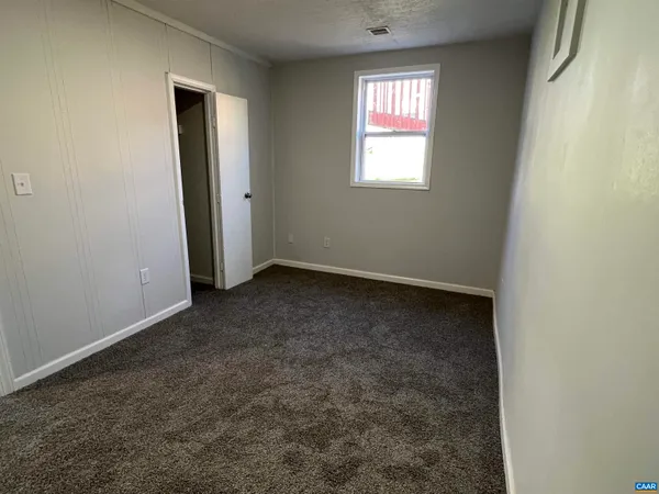 a view of hallway with closet