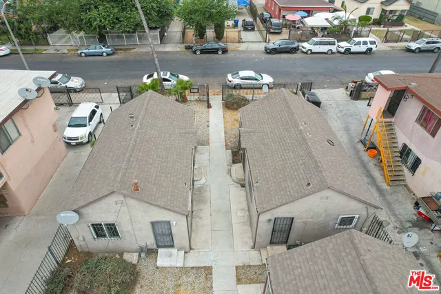 a view of a street with cars