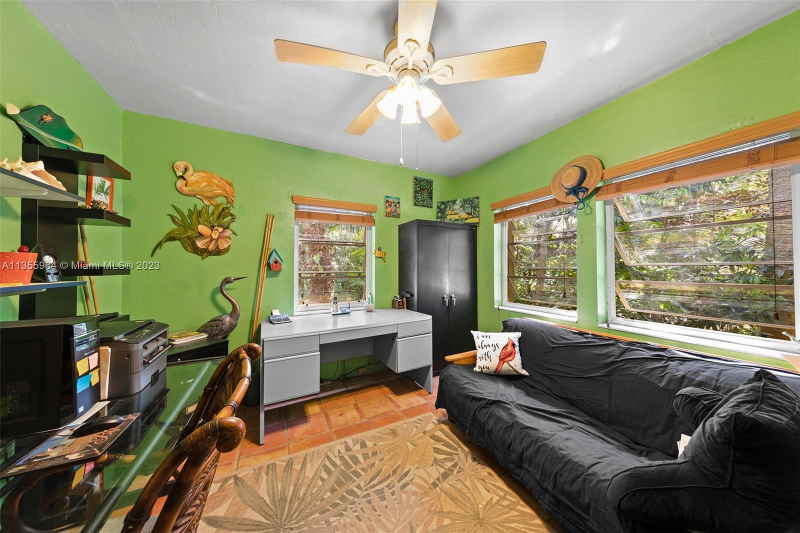 Redlands Homestead, FL 33031 - Photo 16 of 31 a living room with furniture and a large window