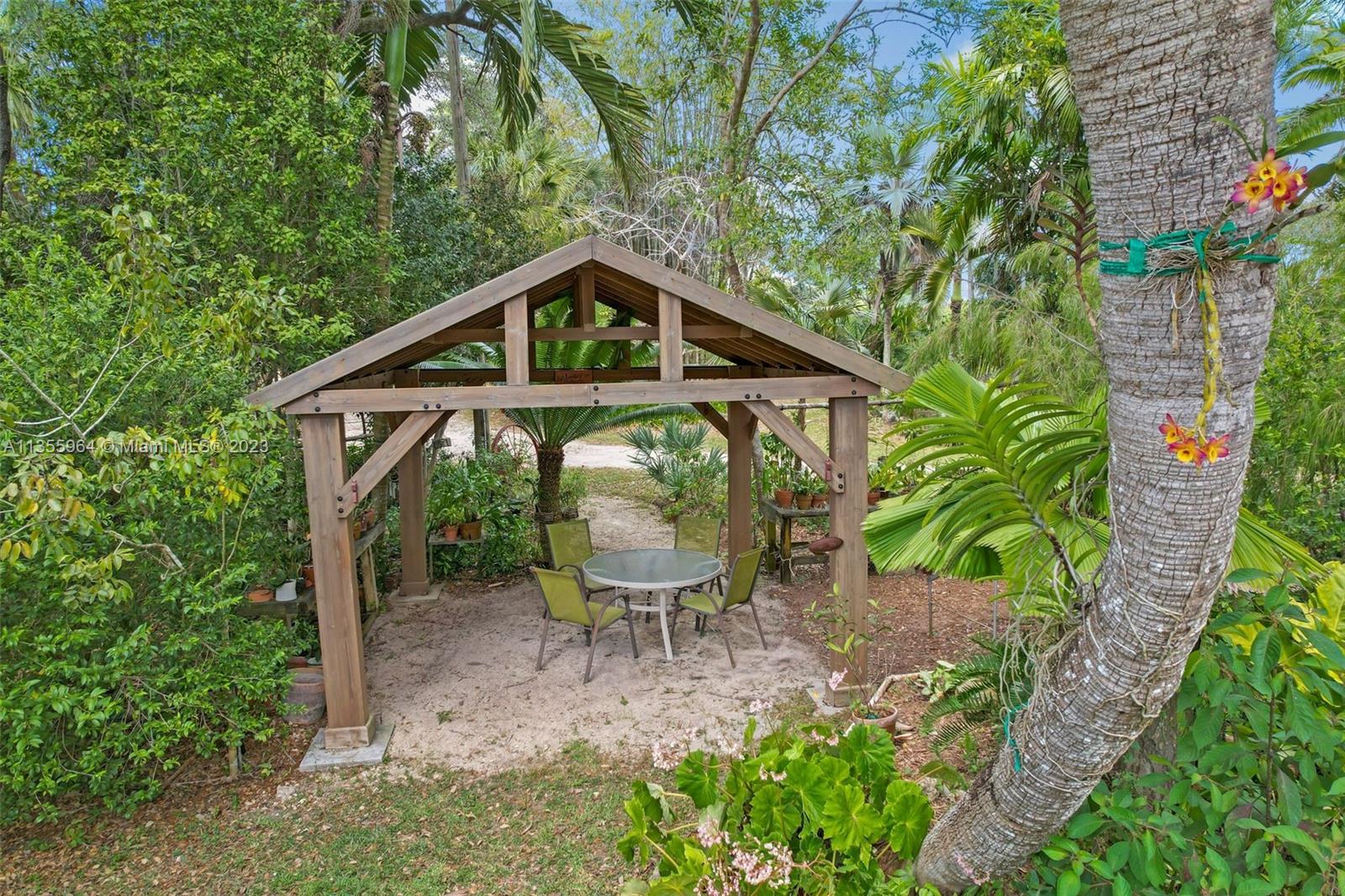Redlands Homestead, FL 33031 - Photo 21 of 31 a front view of a house with garden
