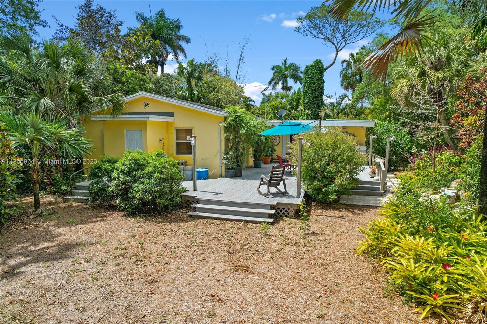 Redlands Homestead, FL 33031 - Photo 3 of 31 a front view of a house with a yard