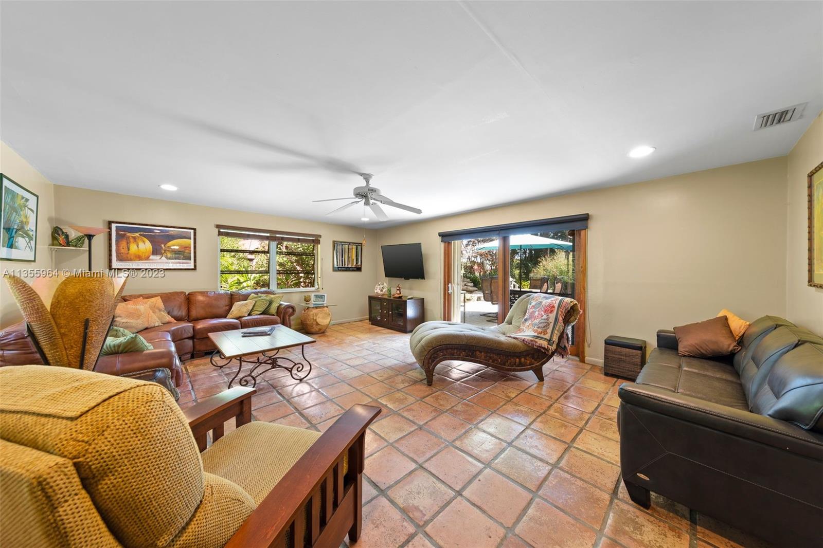 Redlands Homestead, FL 33031 - Photo 6 of 31 a living room with furniture and a large window