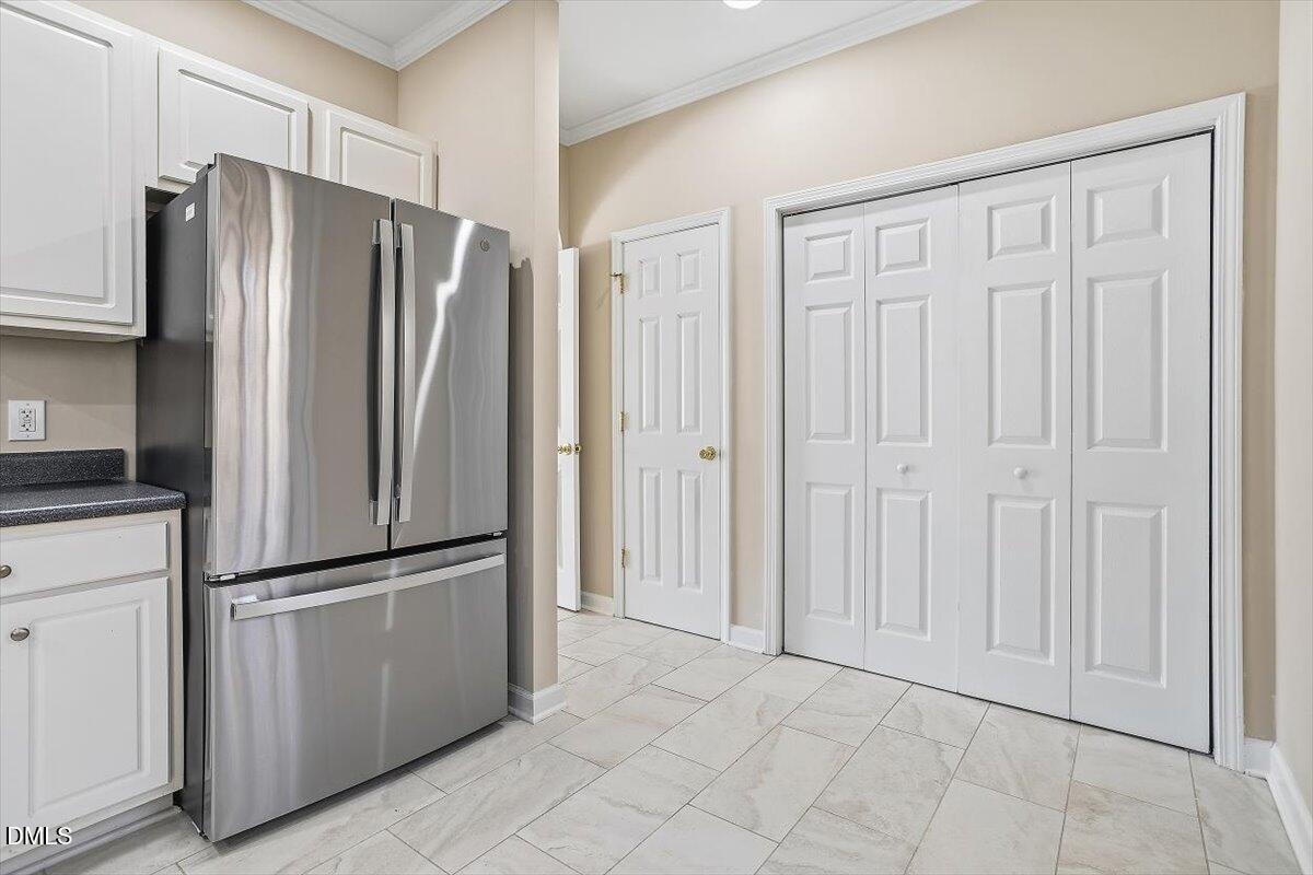 2220 Trailwood Valley Circle Raleigh, NC 27603 - Photo 20 of 37 a view of kitchen with refrigerator cabinets and furniture