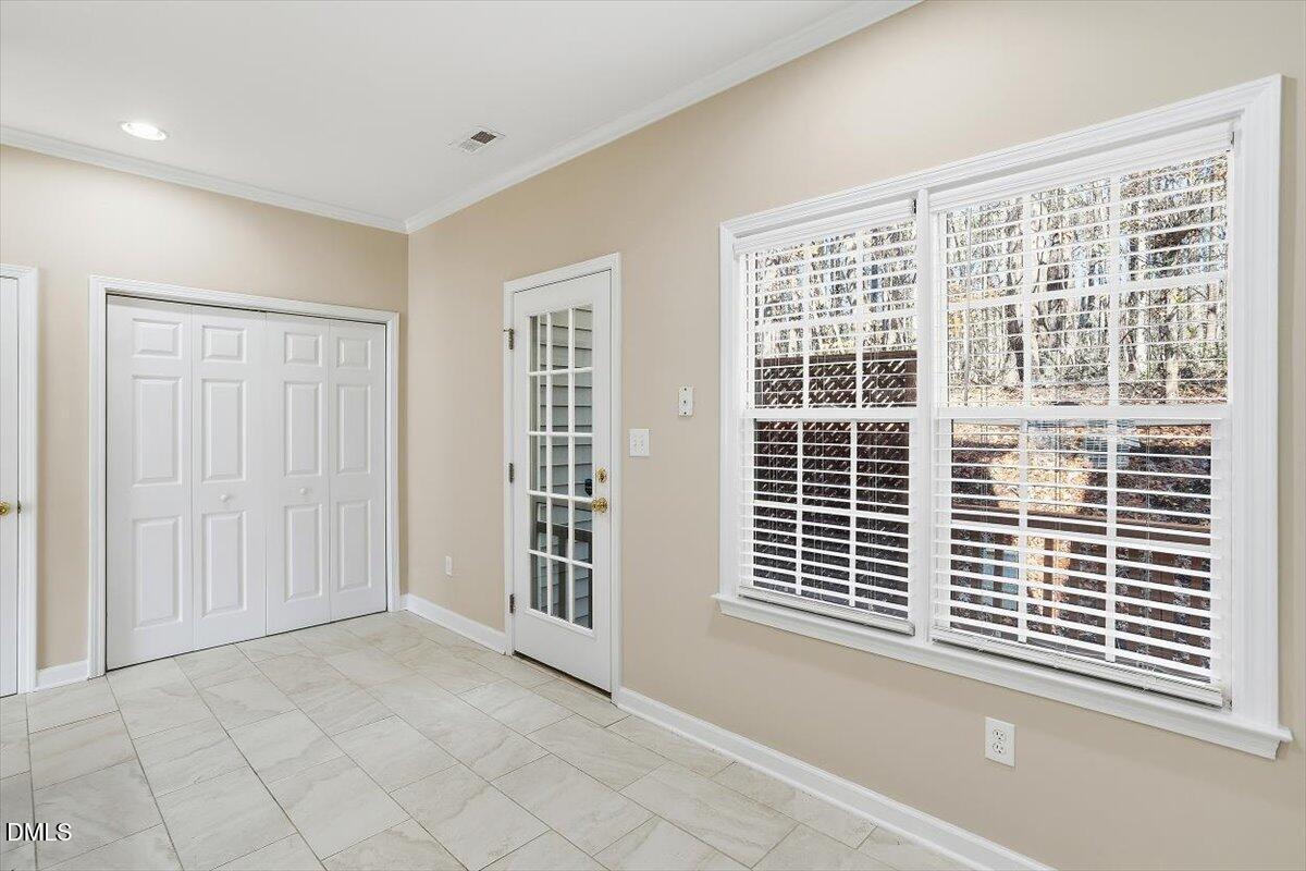 2220 Trailwood Valley Circle Raleigh, NC 27603 - Photo 25 of 37 a view of empty room with windows