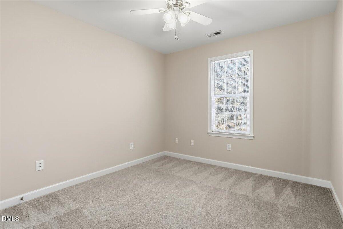 2220 Trailwood Valley Circle Raleigh, NC 27603 - Photo 26 of 37 an empty room with windows