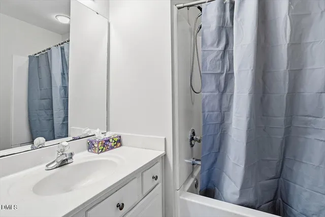 a view of a hallway with windows