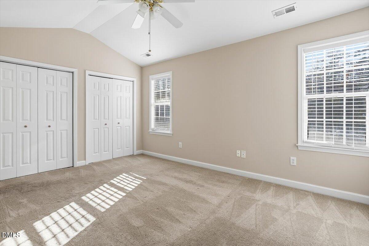 2220 Trailwood Valley Circle Raleigh, NC 27603 - Photo 30 of 37 a view of an empty room with a window