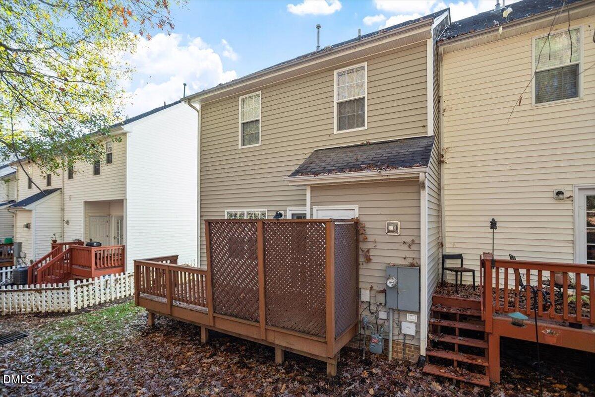2220 Trailwood Valley Circle Raleigh, NC 27603 - Photo 6 of 37 a view of a house with a yard and furniture