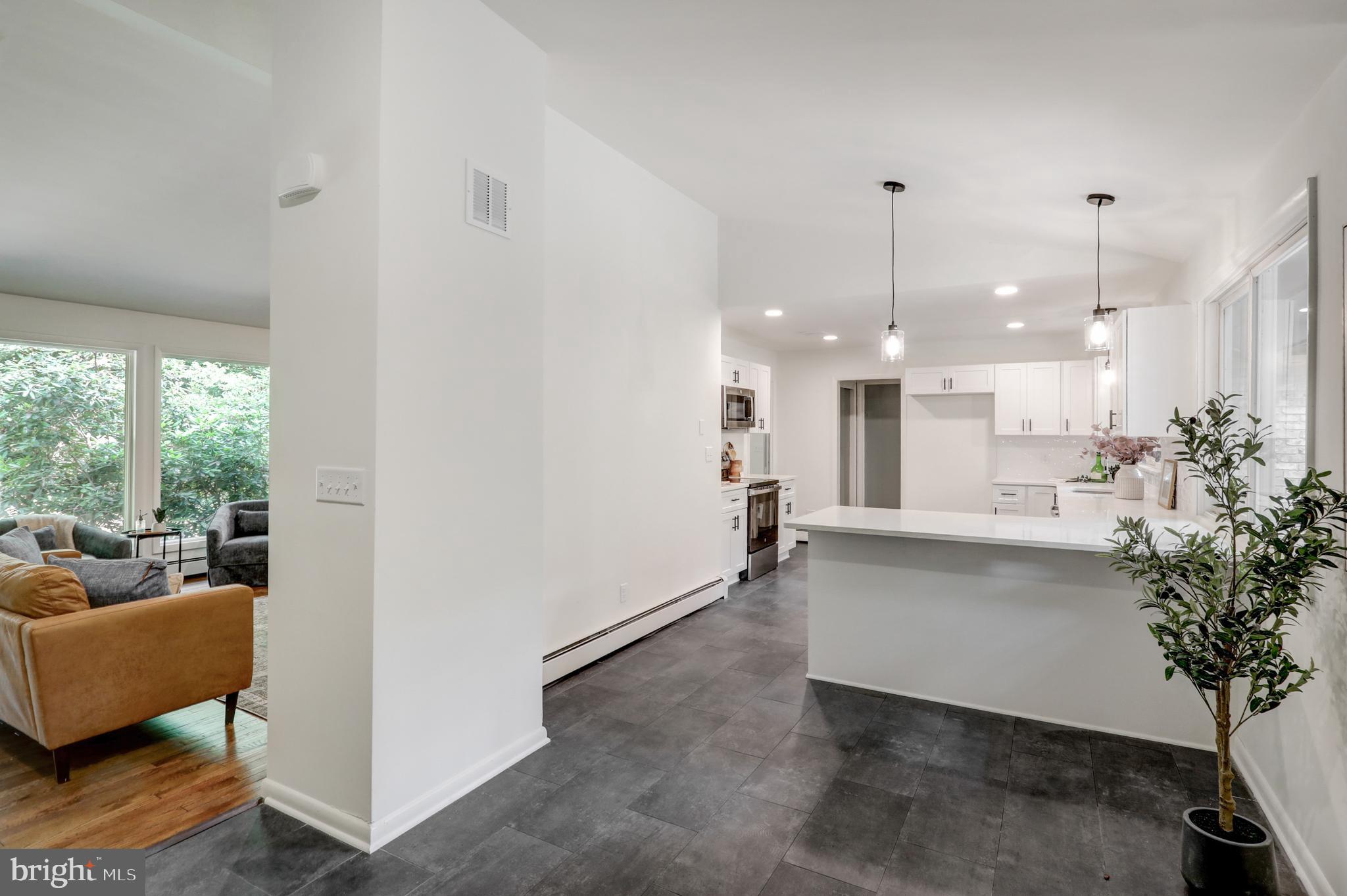 1254 Pinch Valley Road Westminster, MD 21158 - Photo 12 of 45 a view of a living room and kitchen