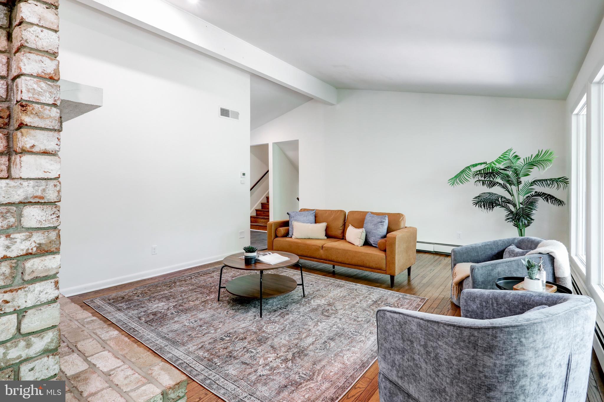 1254 Pinch Valley Road Westminster, MD 21158 - Photo 20 of 45 a living room with furniture and a rug