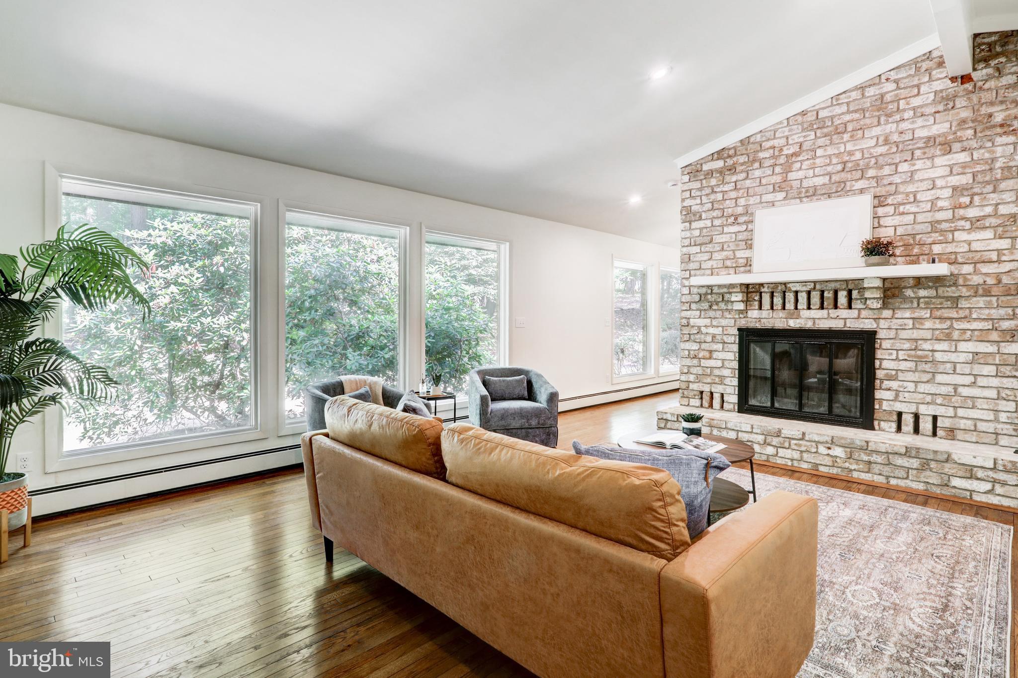 1254 Pinch Valley Road Westminster, MD 21158 - Photo 21 of 45 a living room with furniture and a fireplace