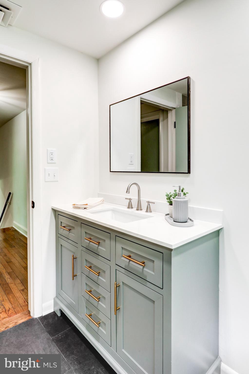 1254 Pinch Valley Road Westminster, MD 21158 - Photo 29 of 45 a bathroom with a double vanity sink mirror and