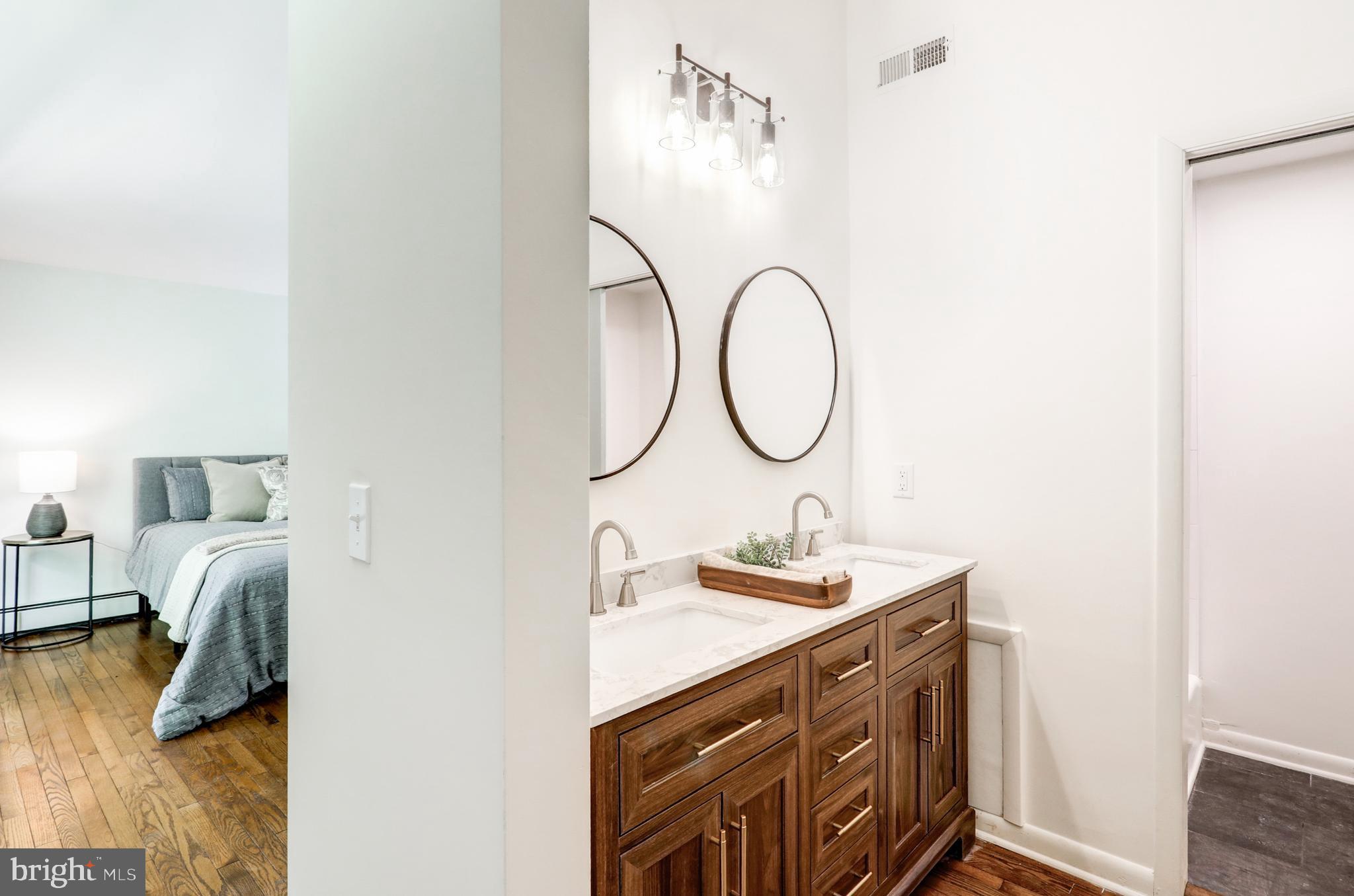 1254 Pinch Valley Road Westminster, MD 21158 - Photo 32 of 45 a bathroom with a sink and a mirror