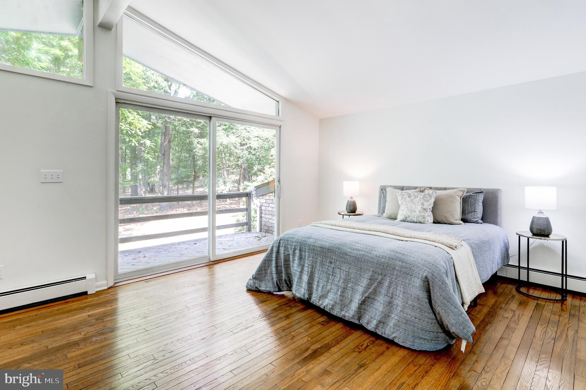 1254 Pinch Valley Road Westminster, MD 21158 - Photo 36 of 45 a bedroom with a bed and wooden floor