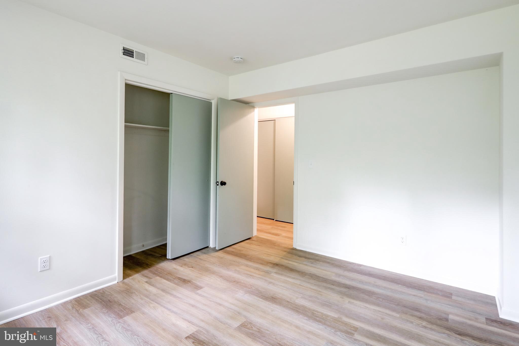 1254 Pinch Valley Road Westminster, MD 21158 - Photo 39 of 45 a view of an empty room with wooden floor