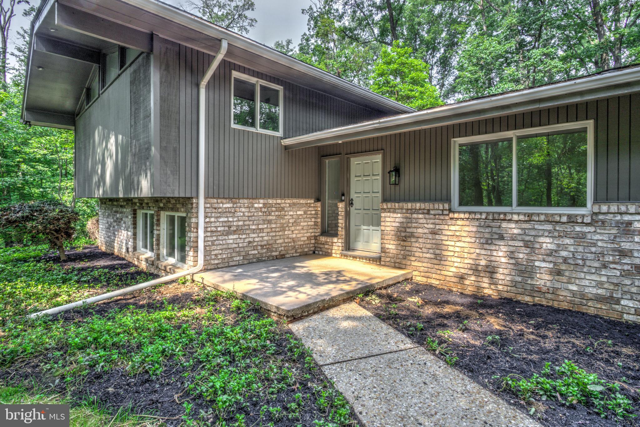 1254 Pinch Valley Road Westminster, MD 21158 - Photo 4 of 45 a front view of a house with garden