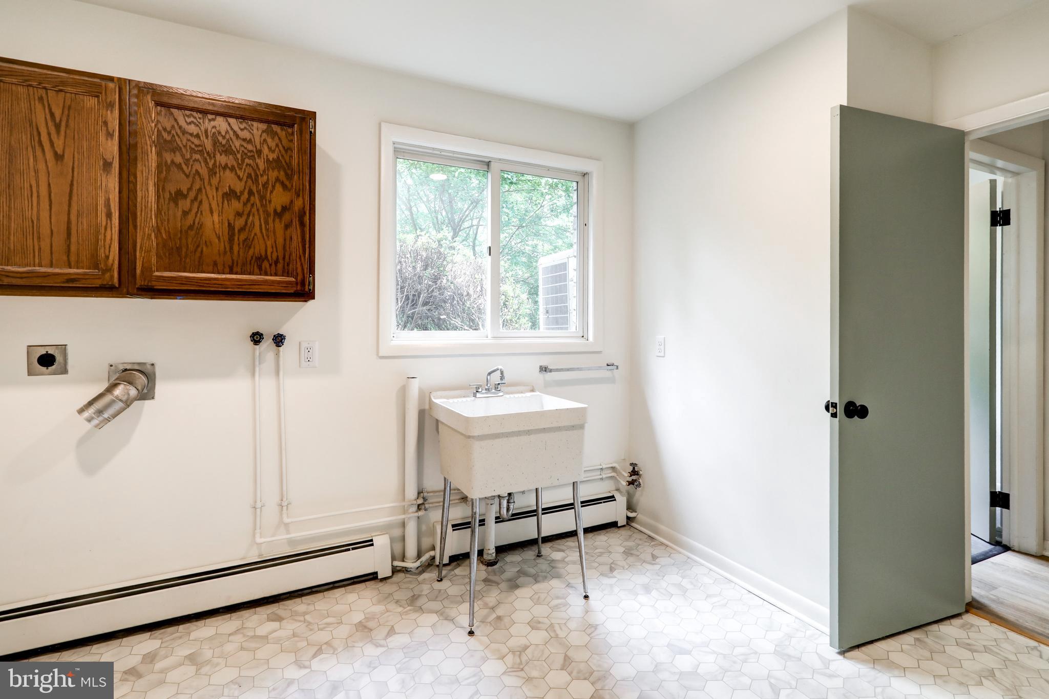 1254 Pinch Valley Road Westminster, MD 21158 - Photo 42 of 45 a bathroom with a sink and a mirror