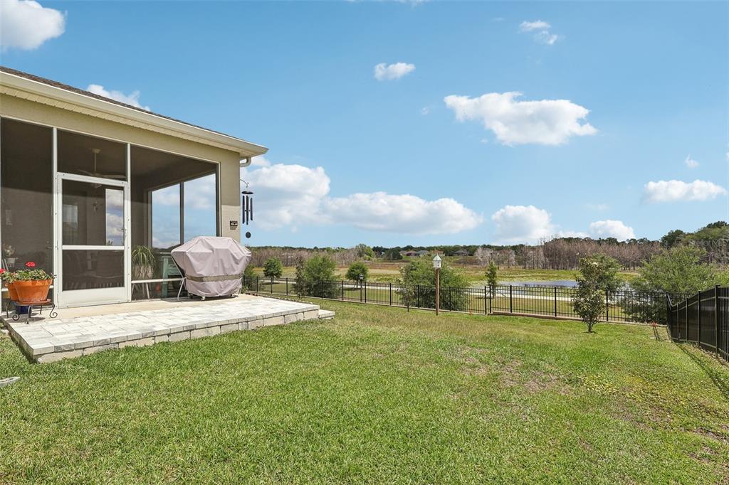 6049 Claystone Way Mount Dora, FL 32757 - Photo 38 of 55 a view of an house with backyard space and balcony